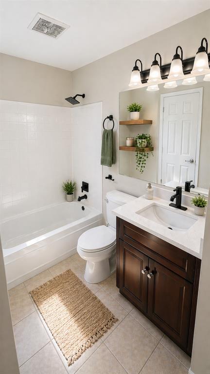 1695 Lee Road, Unit C206 Winter Park, FL 32789 - Photo 12 of 18 a bathroom with a sink a toilet and a bathtub