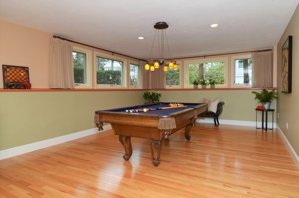 151 Country Club Road Newton, MA 02459 - Photo 27 of 30 a living room with furniture and a large window