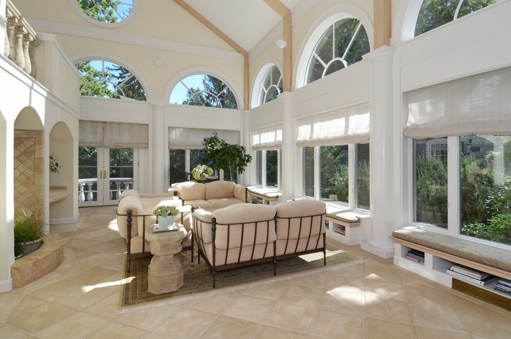 151 Country Club Road Newton, MA 02459 - Photo 7 of 30 a living room with furniture and a large window