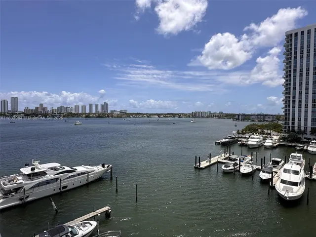 a view of a lake with boats and lake view