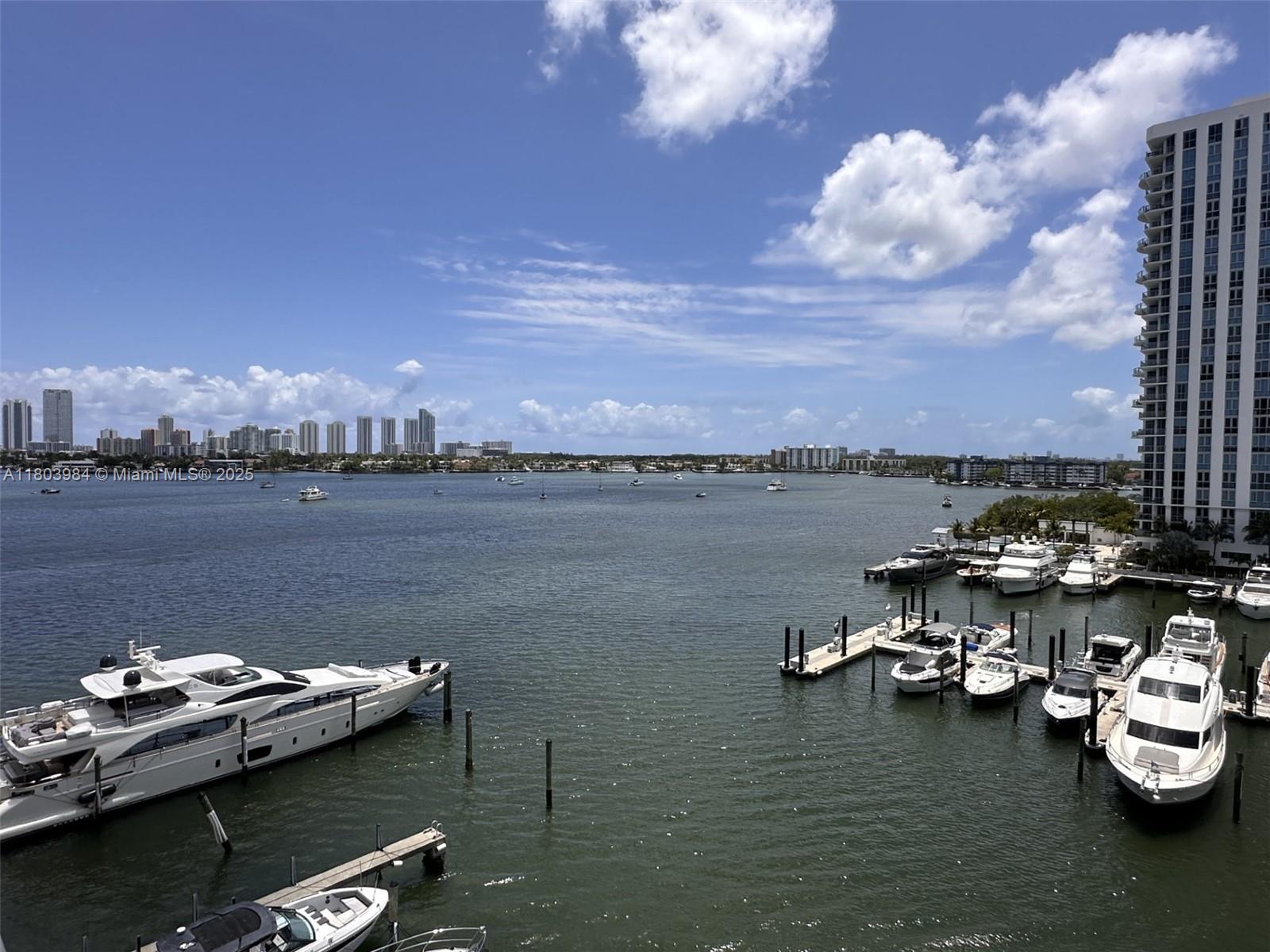17211 Biscayne Boulevard, Unit 13 Miami, FL 33160 - Photo 8 of 9 a view of a lake with boats and lake view