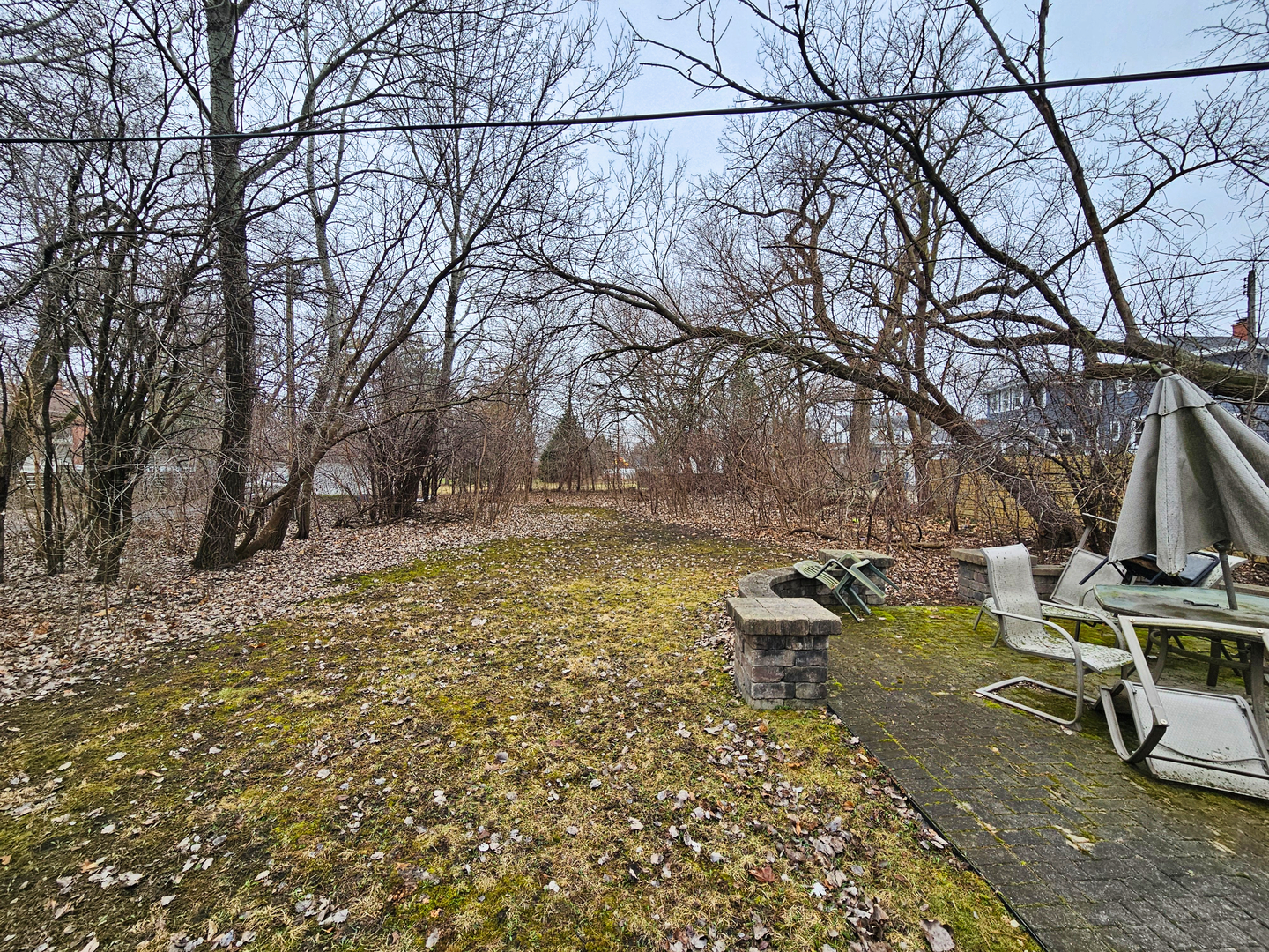 270 East St Charles Road Elmhurst, IL 60126 - Photo 6 of 22 a backyard of a house with table and chairs