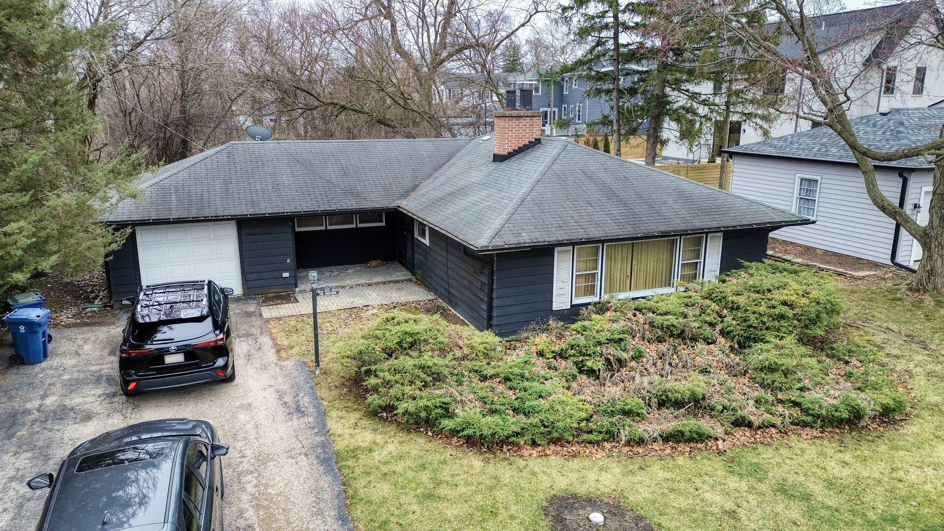 270 East St Charles Road Elmhurst, IL 60126 - Photo 10 of 22 a house view with a car parked in front of it