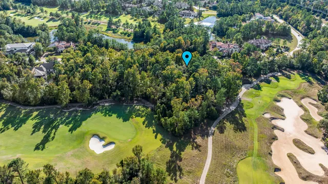 a view of a lake with a house