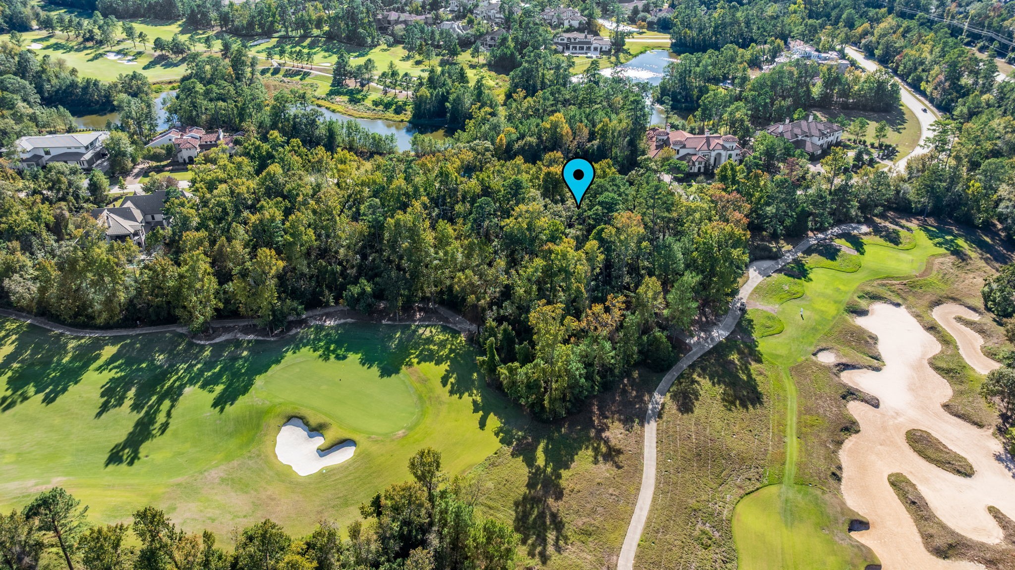 75 Mediterra Way Spring, TX 77389 - Photo 7 of 23 a view of a lake with a house