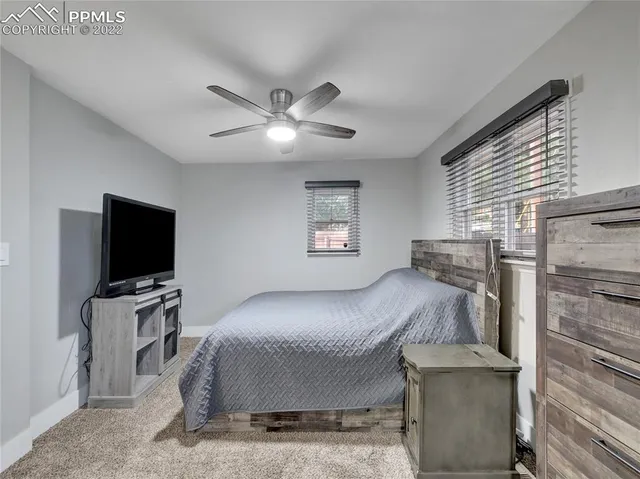 a view of hallway with chandelier