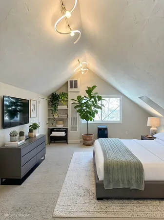 a living room with furniture fireplace and flat screen tv