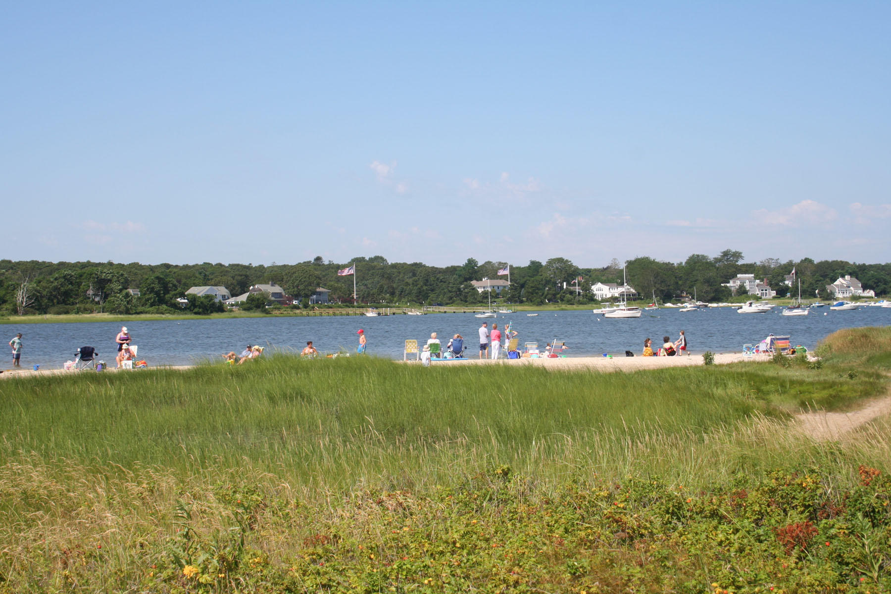 3040 Falmouth Road, Unit F3 Osterville, MA 02655 - Photo 12 of 21 a view of a lake with houses in the back