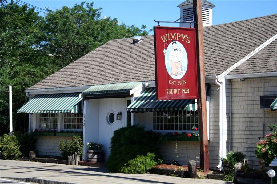 3040 Falmouth Road, Unit F3 Osterville, MA 02655 - Photo 19 of 21 a front view of a house with garden