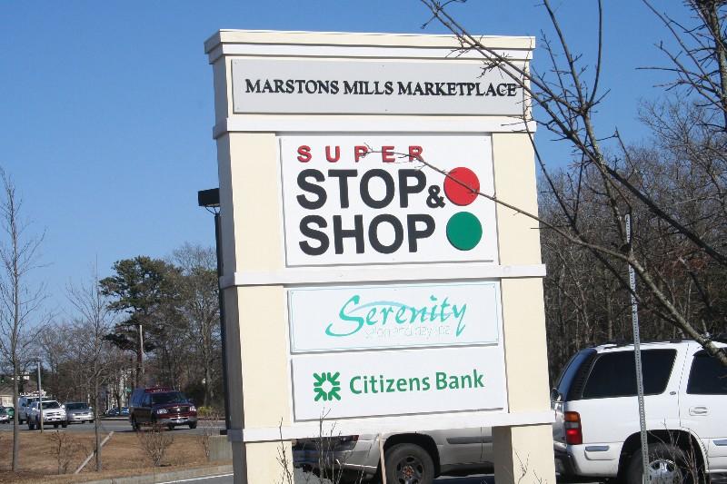 3040 Falmouth Road, Unit F3 Osterville, MA 02655 - Photo 21 of 21 a sign that is on the wall of a building