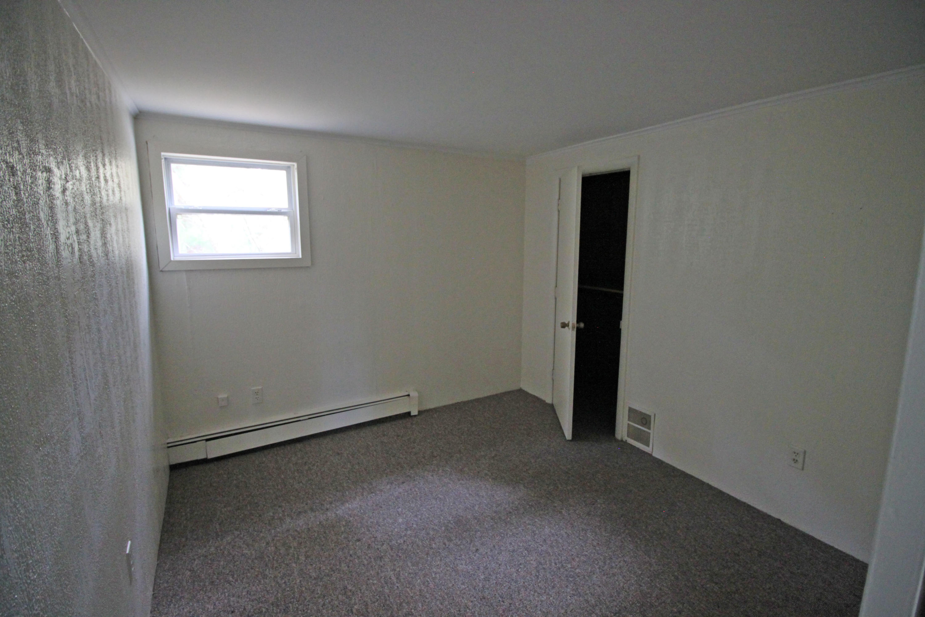 3040 Falmouth Road, Unit F3 Osterville, MA 02655 - Photo 5 of 21 an empty room with windows