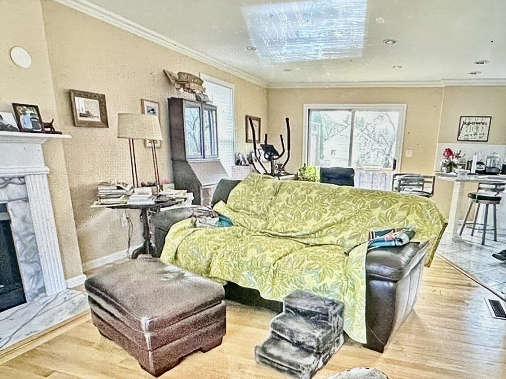 21 Hamlet Street, Unit 21 Newton, MA 02459 - Photo 12 of 15 a living room with furniture and a table