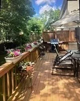a view of a room with wooden deck