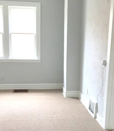 a view of a small space with a window
