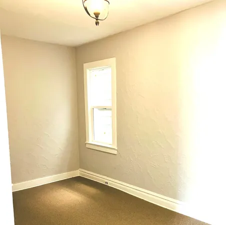 an empty room with a window
