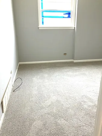 a view of a room with rack on the wall