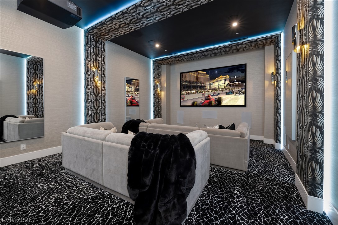 611 Cityview Ridge Drive Henderson, NV 89012 - Photo 33 of 66 Dramatic lighting and custom textured wall details define this luxury home theater space.