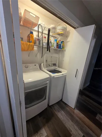 a utility room with dryer and washer