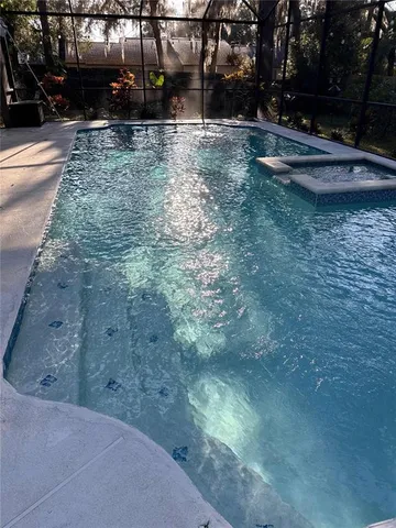 a view of a backyard of the house