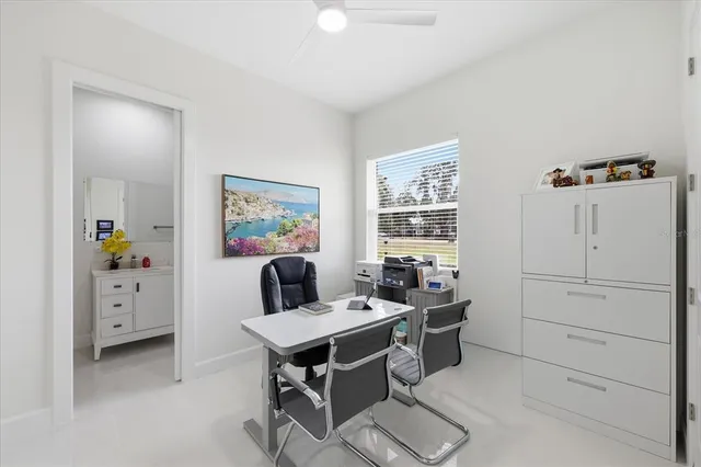 a workspace with furniture and window