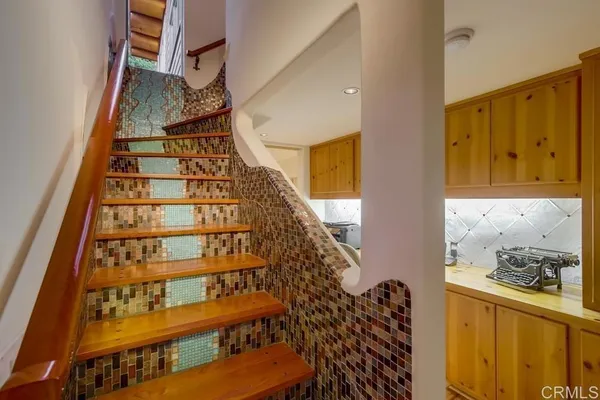 a utility room with sink dryer and washer