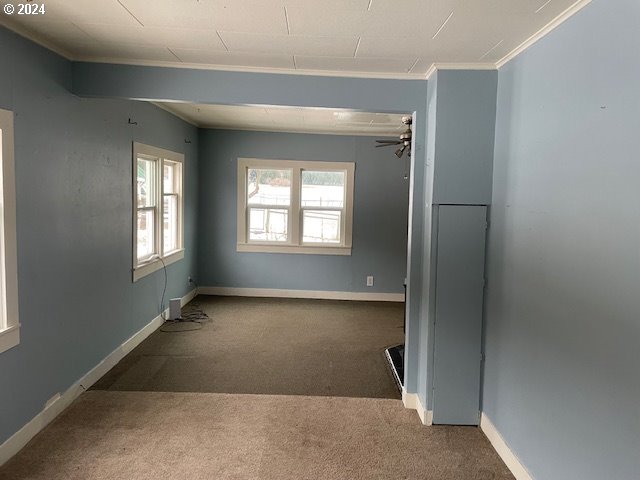 62254 Wallowa Mtn Loop Road Joseph, OR 97846 - Photo 31 of 35 an empty room with windows