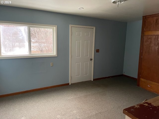 62254 Wallowa Mtn Loop Road Joseph, OR 97846 - Photo 35 of 35 an empty room with windows