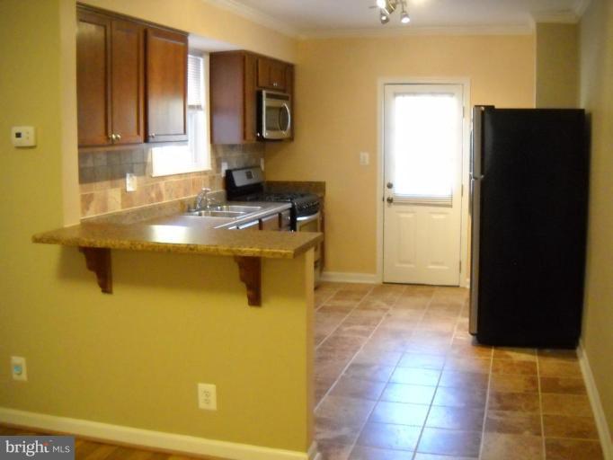 5639 Govane Avenue Baltimore, MD 21212 - Photo 7 of 30 Kitchen/Family Room