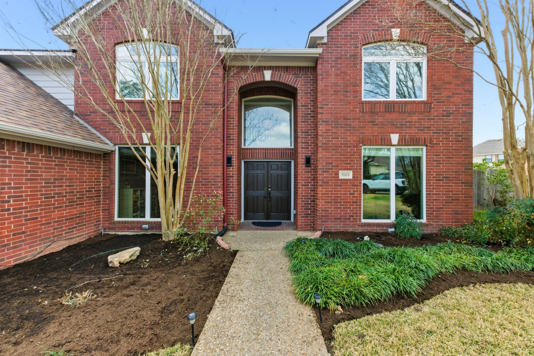 5705 Ballenton Court Austin, TX 78739 - Photo 2 of 30 a front view of a house