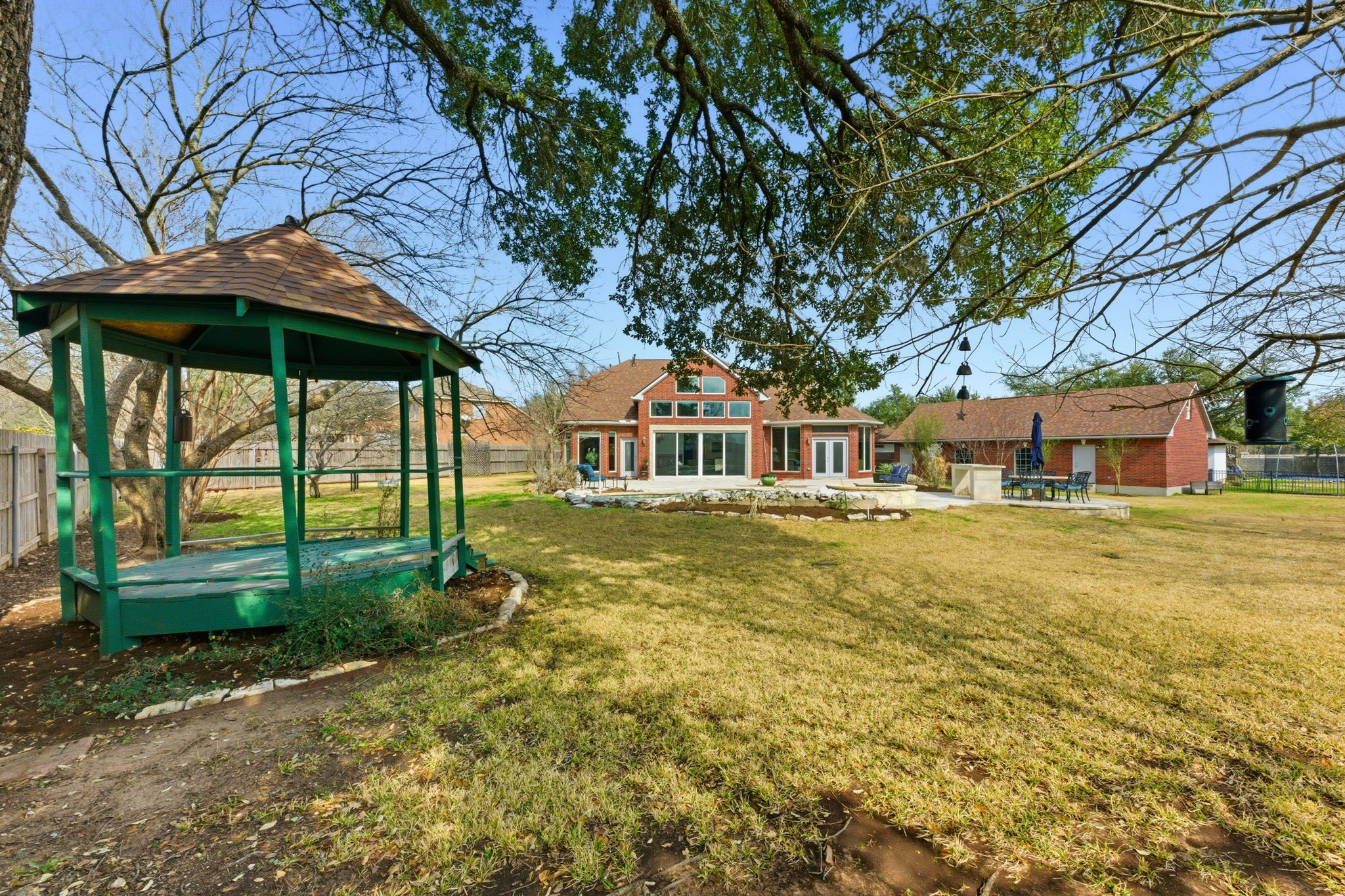 5705 Ballenton Court Austin, TX 78739 - Photo 28 of 30 a front view of a house with a garden