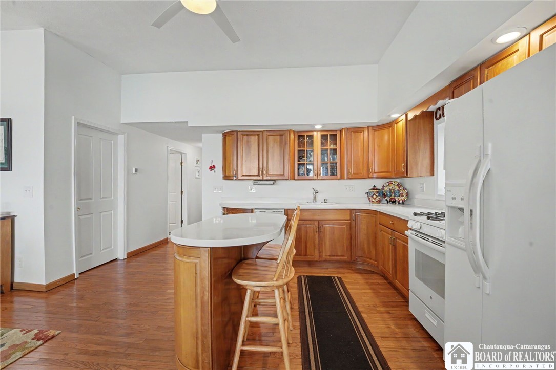 4568 Warners Bay Road Ellery, NY 14712 - Photo 11 of 43 Bright Kitchen with breakfast bar, cherry cabinetr