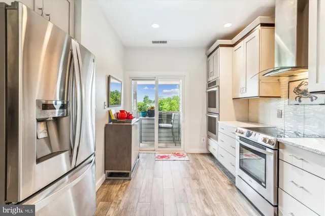 a bedroom with a bed and a lamp on table
