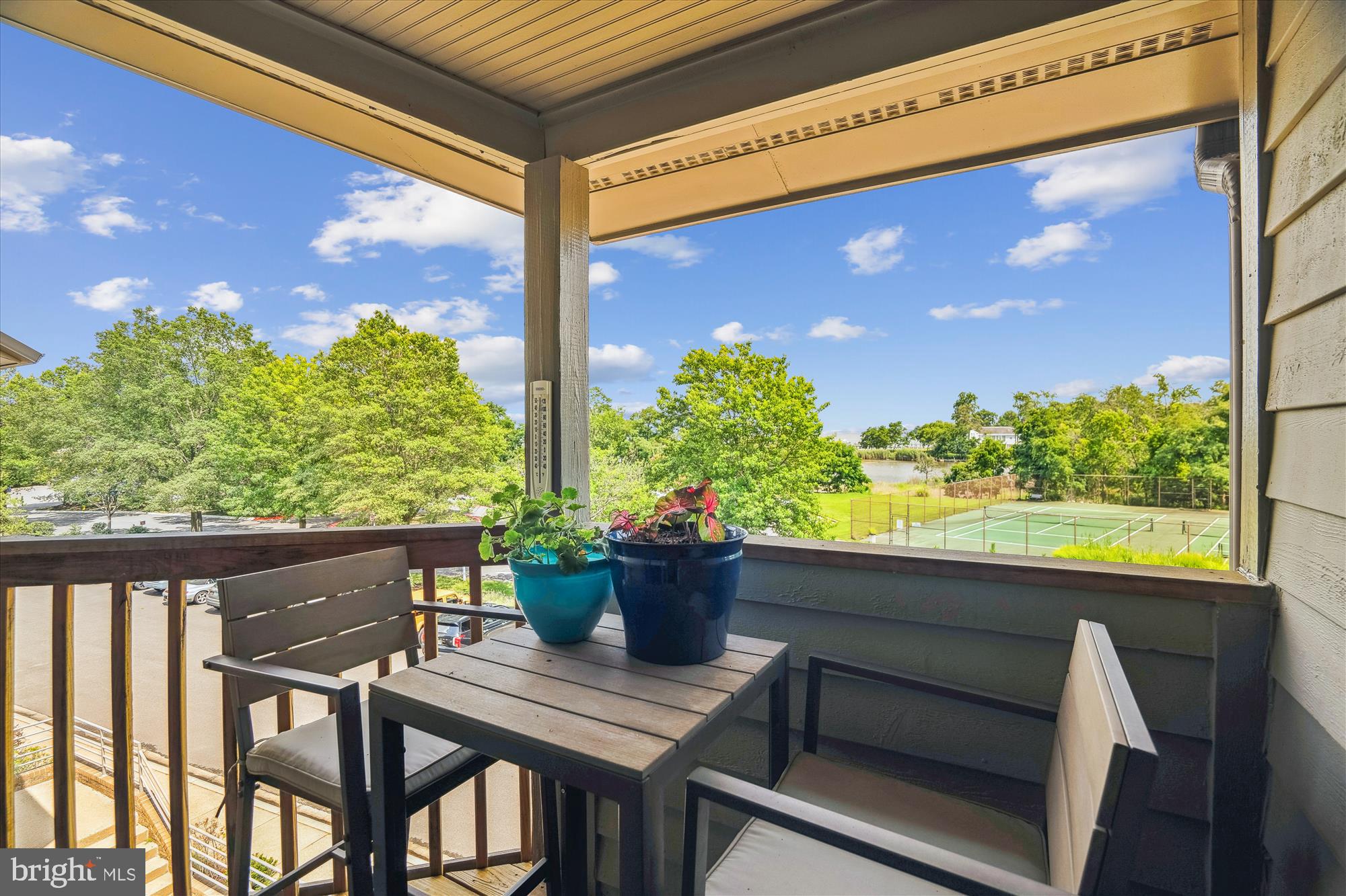 2108 Chesapeake Harbour Drive East, Unit 201 Annapolis, MD 21403 - Photo 19 of 82 a view of a chairs and table in patio