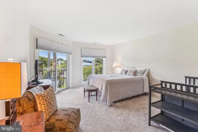 a bedroom with a bed and closet