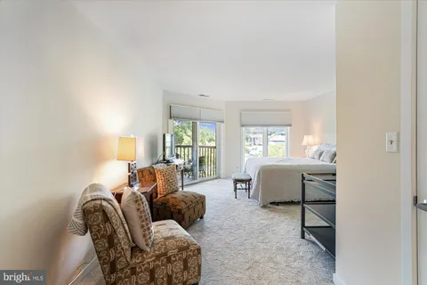 a bedroom with a bed and a closet