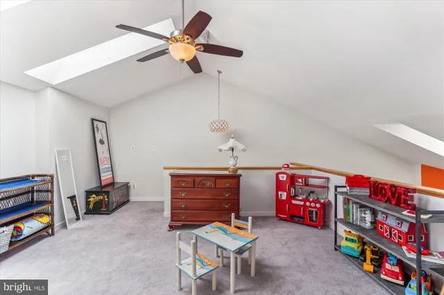 a view of swimming pool with outdoor seating and yard