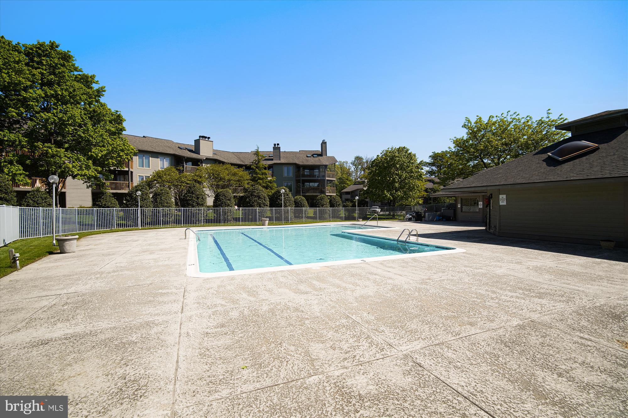 2108 Chesapeake Harbour Drive East, Unit 201 Annapolis, MD 21403 - Photo 70 of 82 a view of a swimming pool with a yard
