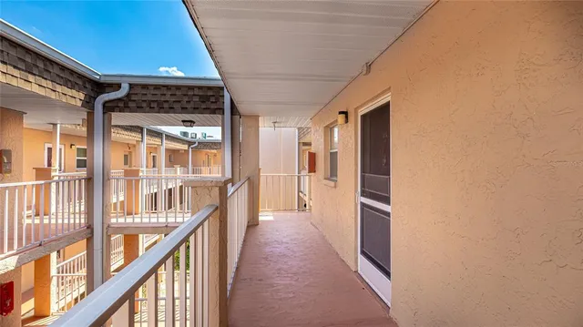 a view of hallway with stairs