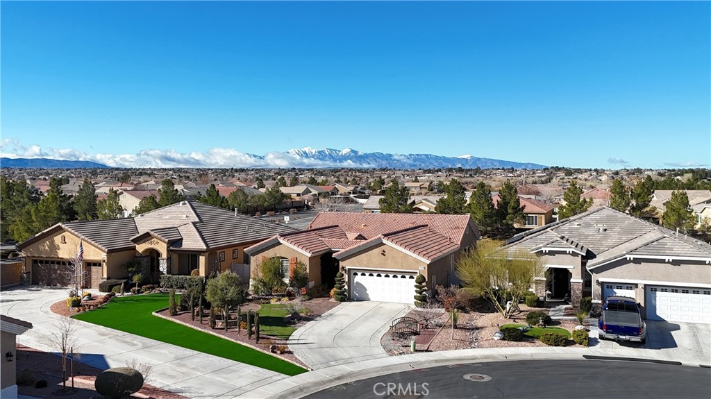 10402 Nobleton Road Apple Valley, CA 92308 - Photo 1 of 1 an aerial view of residential houses and street