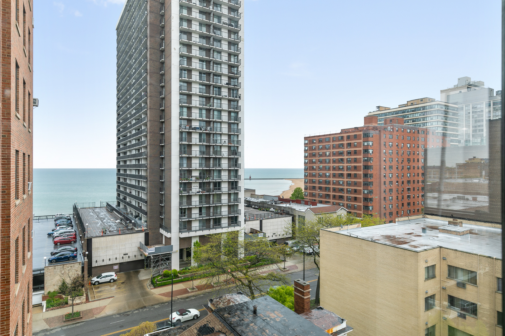 5858 North Sheridan Road, Unit 808 Chicago, IL 60660 - Photo 7 of 16 a view of a city with tall buildings