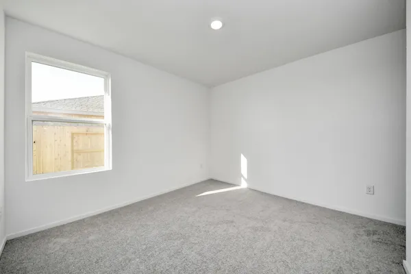 an empty room with a window