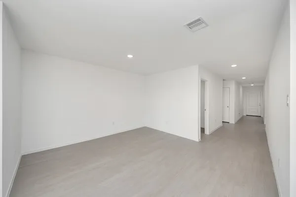 an empty room with a natural light