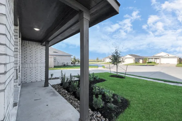 a view of a back yard of the house