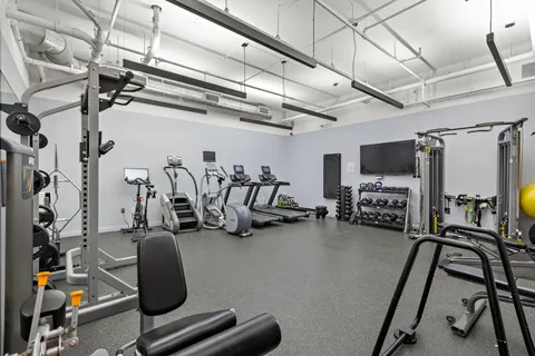 a view of a room with gym equipment