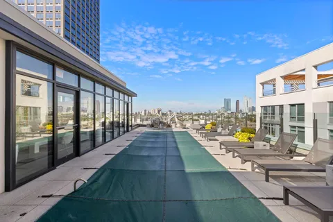 a view of a terrace with chairs and a patio