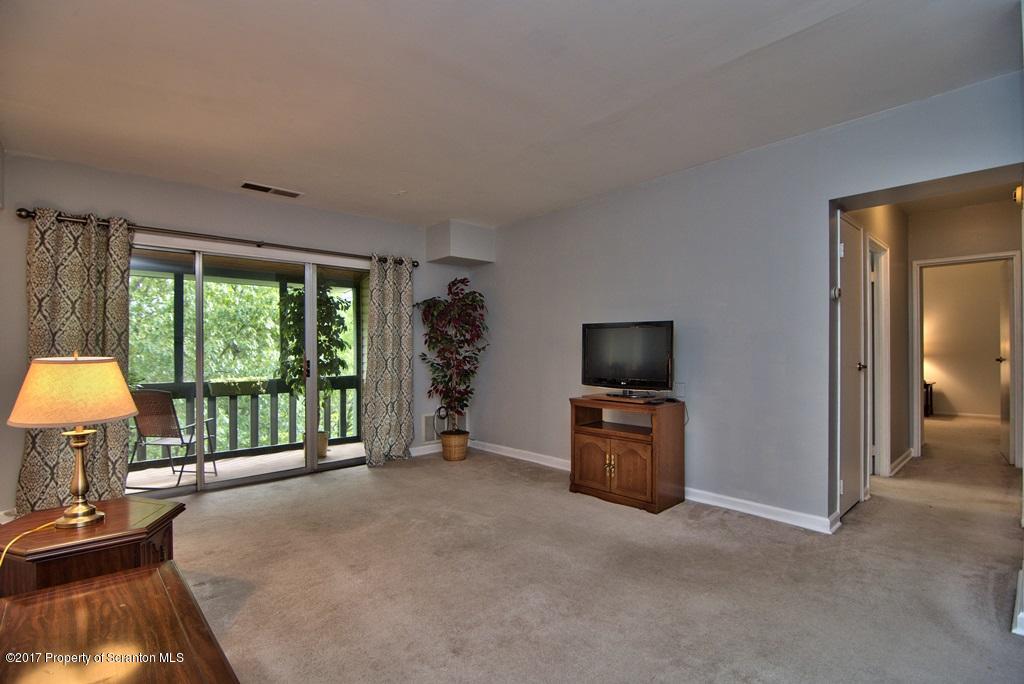 1211 Summit Pointe Scranton, PA 18508 - Photo 15 of 33 a living room with furniture and a flat screen tv