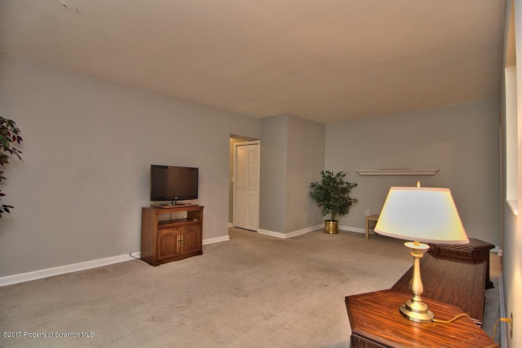 1211 Summit Pointe Scranton, PA 18508 - Photo 19 of 33 a room with furniture and a flat screen tv