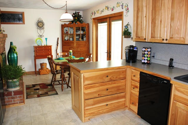 65 Iron Ridge Road Rocky Mount, VA 24151 - Photo 13 of 33 a kitchen with a refrigerator and a sink