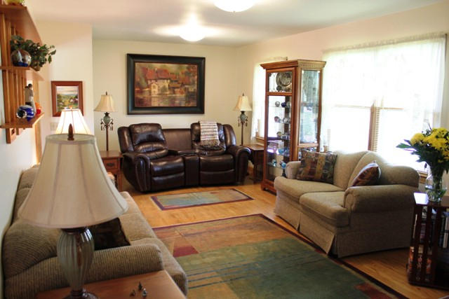 65 Iron Ridge Road Rocky Mount, VA 24151 - Photo 17 of 33 a living room with furniture and a large window