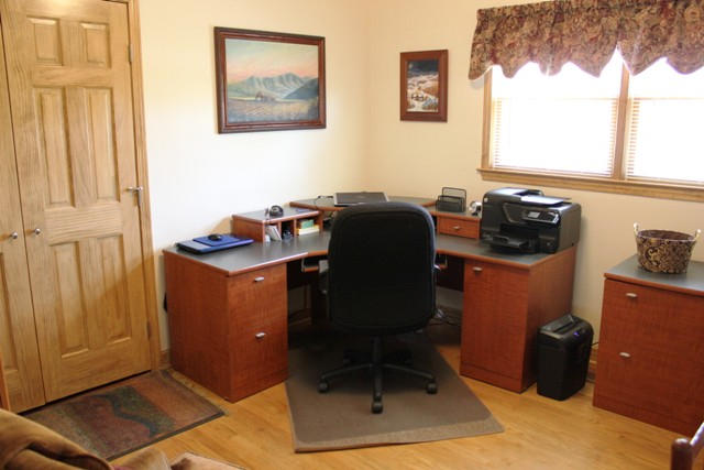 65 Iron Ridge Road Rocky Mount, VA 24151 - Photo 31 of 33 a view of a workspace with furniture and a window